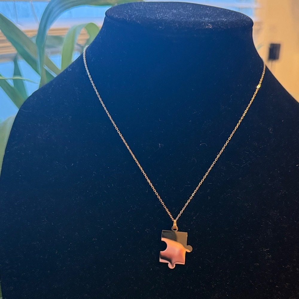 Plunder Gold Colored Puzzle Piece Necklace